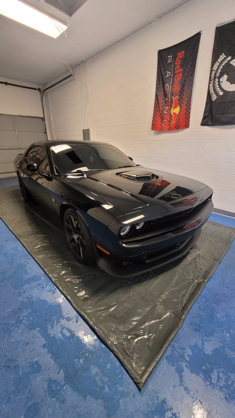 Black car detailed at Freedom Auto Detailing in Liberty Hill TX — professional in-house and mobile service.

